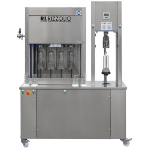 Isobarer Füller für Weine und andere prickelnde oder kohlensäurehaltige Getränke mit einem Verschließer für Aluminiumverschlüsse